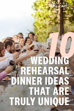 a group of people sitting at a table with wine glasses in their hands and the words 10 wedding rehearsal dinner ideas that are truly unique