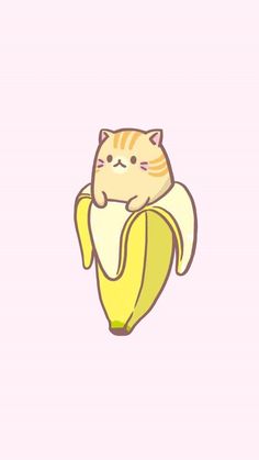 a cat sitting on top of a banana