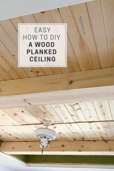 a ceiling fan that is attached to a wood planked ceiling with the words easy how to diy a wood planked ceiling