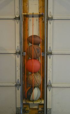 an advertisement for sports balls in a storage rack with the words diy sportss ball holder