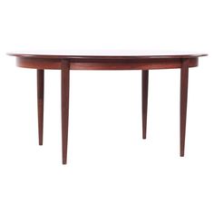 an oval wooden table with two legs and a circular top, against a white background