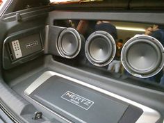 the inside of a car with speakers in it