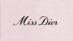 the word miss dior written in cursive writing