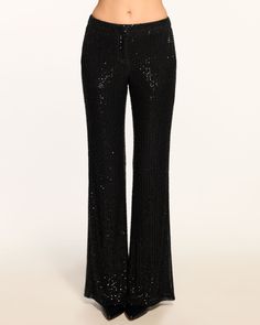 30% OFF SITEWIDE is Happening Now! Code Auto-Applied at Checkout. Meet the Olivian: the perfect party pant. This seventies-inspired flare pant is crafted from an allover sequin beaded mesh fabrication and made for nights on the dance floor. Style with the matching Sullivan halter top for a high impact look, or switch it up and style with a silky pop of color halter top or dress it down with a sweater. Size & Fit – Fits true to size, take your normal size – Model is Wearing Size 0 – Model is 5'9"– Inseam: 34" Size Guide Details & Care – Lined– Flare leg – Hook and eye and zipper closure – Allover sequin beaded mesh – Mid rise– Dry Clean or Hand Wash– Style #: A10245012– 95% Polyester 5% Spandex – Lining: 100% Polyester Free Delivery & Easy Returns We offer free ground shipping o Cami Nyc, Party Pants, Flare Pant, On The Dance Floor, Sequin Beading, Trina Turk, The Dance, Sweater Blouse, Perfect Party