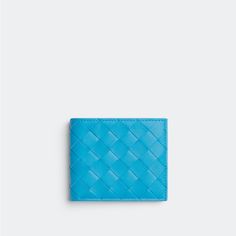 A Classic Bifold Wallet From Bottega Veneta Featuring Brand Signature Leather Woven Pattern (Intriciato) Sky Blue Intriciato Nappa Calf Leather Inside Pebbled Leather Lining 4 Individual Card Slots Coin Compartment W/ Leather Flap Closure 2 Side Multiple-Card Compartments 2 Bill/Cash Compartments Designer Blue Bags With Card Slots, Blue Designer Bags With Card Slots, Formal Blue Bags With Card Slots, Designer Blue Wallet For Everyday Use, Designer Blue Wallet For Formal Occasions, Designer Blue Wallets For Formal Occasion, Classic Blue Bags With Card Slots, Blue Leather Wallet With Coin Pocket, Blue Rectangular Wallets For Formal Occasions