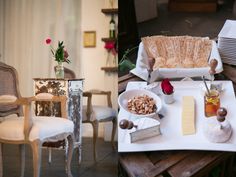 a tray with cheese, nuts and other food items on it sitting on a table