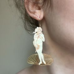 "Acrylic statement earrings inspired by Botticelli's renaissance masterpiece \"The Birth of Venus.\" Please allow for some variations between pieces since they are hand painted original designs assembled with love #slowmade. She is 1.5 inches wide in the shell and 2.5 inches tall. All photos show the gold plated option and the modeling shot shows the gold filled option. Made to order: Please allow 1-2 days processing. Materials: gold plated hypoallergenic surgical stainless steel or 14k Gold fil Birth Of Venus Botticelli, Venus Botticelli, Venus Painting, Venus Jewelry, Radiant Halo, Birth Of Venus, Rose Gold Mirror, Mount Vernon, Gold Earrings Dangle