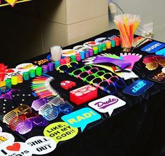 a table topped with lots of colorful items