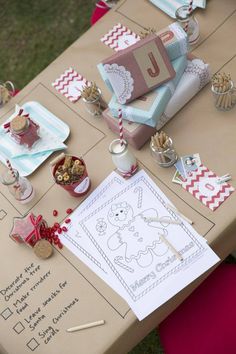 a table set up for a baby's first birthday