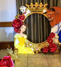 the beauty and the beast photo frame is decorated with roses