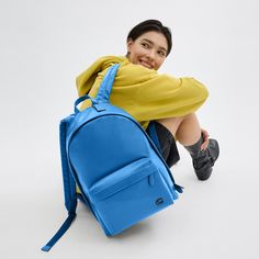 Our Hall is made for doing it all (just like you). This versatile backpack has space for a 16” laptop interior organization pockets and an exterior pocket for easy access to essentials. Featuring our Signature hardware and adjustable shoulder straps it’s crafted of our pliable lightest weight leather with a smooth soft finish. (Lighten up.) | Coach Hall Backpack - Blueberry Casual Blue Bag For Commuting, Casual Laptop Bag With Zipper Pocket, Casual Commuting Backpack With Ykk Zipper, Backpack Pose, Classic Coach Backpack With Adjustable Strap, Modern Coach Standard Backpack, Luxury Coach Standard Backpack, Functional Coach Backpack For On-the-go, Everyday Gold-tone Hardware Backpack