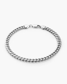 Elevate your wristwear with our silver Cuban Link Bracelet Stack, a perfect union of classic charm and contemporary style. Featuring a substantial 5mm gauge paired with a sleek 3mm counterpart, this stack embodies a strength and refined elegance. Crafted from high-quality 925 sterling silver and enduring rhodium, this men's bracelet stack delivers a versatile and sophisticated addition to your collection, showcasing a timeless appeal that transcends trends. Cuban Link Chain Men, Silver Bracelet Stack, Cuban Link Bracelet, Mens Bracelet Silver, Solid Gold Chains, Silver Coat, Men's Bracelet, Silver Chain Bracelet, Matching Bracelet