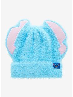 a blue and pink hat with ears on it