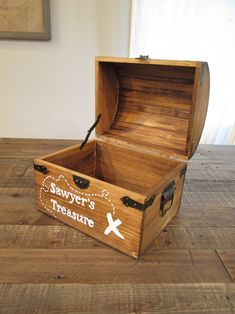 a wooden box sitting on top of a table