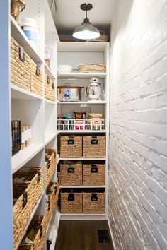 an organized pantry with wicker baskets and other items in the shelves, along with text that reads how to organize a narrow staircase pantry pantry