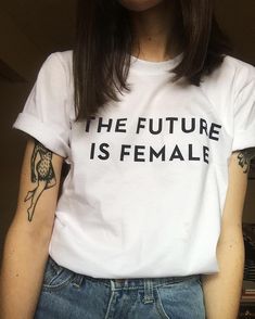 Soft graphic t-shirt with - "The Future is Female" print. Unique fashion outfit for you, for wife, can be the best Mother's Day gift. Celebrate the women in your life with this powerful and stylish "The Future is Female" t-shirt. Perfect for Mother's Day or any day, this shirt sends a strong message of empowerment and support for women everywhere. Made from high-quality, comfortable fabric, this shirt features bold lettering and a classic cut that looks great with any outfit. Wear it to your nex The Future Is Female, Feminism Shirt, Future Is Female, Estilo Indie, Feminist Shirt, Statement Tees, Statement Shirt, Womens Rights, Vintage Sweatshirt