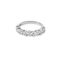 A beautiful multi-stone ring, featuring marquise and round stones. This makes an excellent wedding band or just a brilliant addition to your ring stack! Made of 925 Sterling Silver 14K Gold or Rhodium plating Nickel-free & Hypoallergenic Highest grade cz for an authentic diamond look Available widths: 4mm and 5mm Available in sizes 4-10