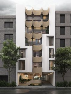 an apartment building with balconies on the top floor