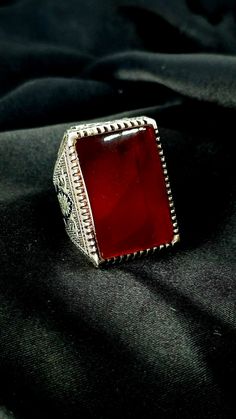 Beautiful size 9  hand made Bahraini sterling silver with large fire red color agate genuine Yemeni aqeeq that will be a strong statement piece Classic Red Agate Jewelry, Formal Red Carnelian Jewelry, Red Carnelian Rings With Polished Finish, Red Carnelian Ring With Polished Finish, Red Polished Carnelian Rings, Formal Red Carnelian Ring, Unique Red Jewelry With Large Stone, Silver Carnelian Ring Stamped 925, Red Carnelian Ring As A Gift