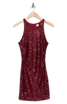 Sparkle all night long in this sleeveless minidress covered in glamorous sequins. Back zip closure Jewel neck Sleeveless Lined 95% polyester, 5% spandex Hand wash, dry flat Imported Sleeveless Contrast Sequin Dress For Date Night, Red Sleeveless Sequin Dress For Homecoming, Sleeveless Contrast Sequin Dress For Night Out, Sleeveless Bodycon Mini Dress For Holiday, Glamorous Red Sleeveless Sequin Dress, Glamorous Sleeveless Sequin Mini Dress, Holiday Glamorous Sleeveless Mini Dress, Glamorous Sleeveless Sequined Bodycon Dress, Glamorous Sleeveless Holiday Mini Dress