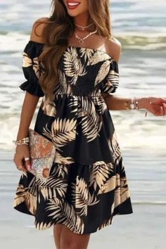 "Embrace bohemian vibes with our Women's Short Sleeve Bohemian Printed Off Shoulder Mini Dress. Featuring an off-shoulder design and eclectic prints, this dress exudes effortless style. With its short sleeves and mini length, it's perfect for casual outings or beach days. Elevate your summer look with this trendy piece." Knee-length Boho Print Midi Dress For Vacation, Knee-length Boho Print Midi Dress For Beach, Knee-length Boho Midi Dress For Beach, Bohemian Off-shoulder Dresses For Vacation, Black Boho Print Maxi Dress For Vacation, Off-shoulder Floral Print Midi Dress For Beach, Black Boho Dress With Print For Vacation, Bohemian Off-shoulder Midi Dress For Brunch, Black Bohemian Midi Dress For Summer