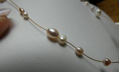 This is much more substantial than meets the eye. beautiful color on the pearls. Adjustable Pearl Drop Necklace For Anniversary, Handmade Elegant Oval Pearl Necklace, Adjustable Teardrop Pearl Drop Necklace, Handmade Classic Pearl Necklace For Formal Occasions, Oval Pearl Drop Necklace For Anniversary, Knot Earrings, Woven Bracelets, Pave Diamonds, Watch Bands