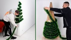 two men are decorating a christmas tree with fake grass on the bottom and top