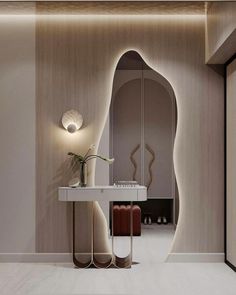 a bathroom with a mirror, sink and stool in the corner next to a door