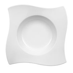 an empty white plate on a white background