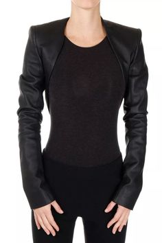 Introducing our women's handmade genuine lambskin black leather cropped jacket--a stunning bolero shrug style that's as versatile as it is chic. Crafted with meticulous attention to detail, this jacket features long sleeves and a wide front open design, making it the perfect statement piece for any season. Made from premium lambskin leather, this jacket offers both durability and luxurious comfort, ensuring that you'll look and feel your best wherever you go. Whether you're heading out for a night on the town or adding a touch of edge to your everyday ensemble, this racer-style jacket is sure to make a statement. Available in a wide range of colors, you can easily find the perfect shade to suit your unique style. Plus, with custom-made plus size options available, every woman can enjoy the Bolero Shrug, Slim Fit Jackets, Custom Jacket, Women's Coats & Jackets, Crop Jacket, Black Jacket, Lambskin Leather, Biker Jacket, Vest Jacket