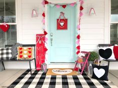 the front porch is decorated for valentine's day