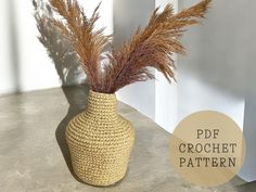 a crocheted vase with grass in it and the text pdf crochet pattern below