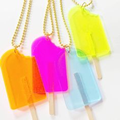 Almost good enough to eat. Choose a popsicle with a bite or not. Available in neon pink, tangerine, lemon and ice blue. Translucent featuring a realistic wooden popsicle stick. Gold colored, sturdy ball chain is 24" making it easy for little kids or adults to slip over their heads. Kid Jewelry, Jewelry Kids, Jewelry Making Business, Cute Valentines Day Gifts, Buying Gold, Jewelry Summer, Popsicle Stick, Kids Necklace, Popsicle Sticks