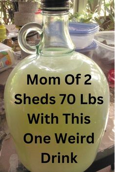 a glass bottle with the words mom of 2 sheds 70lbs with this one weird drink