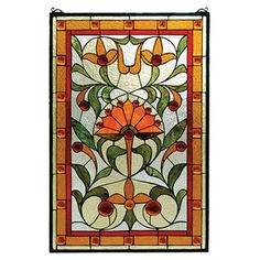 a stained glass window hanging from a chain on a white wall with an orange and green design