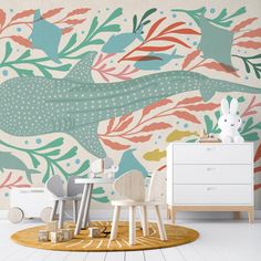 a child's room with colorful wallpaper and wooden toys in the foreground