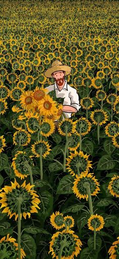 a man sitting in the middle of a field of sunflowers wearing a hat