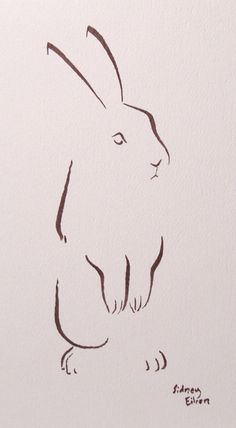 an ink drawing of a rabbit on white paper