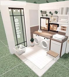 a bathroom with a washer, dryer and toilet inside of it on the floor