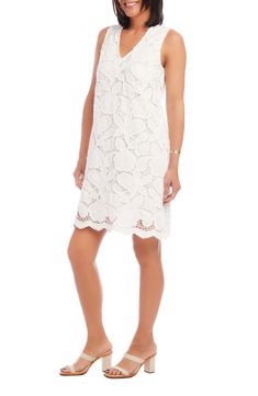 Intricate floral lace brings dreamy charm to this sleeveless shift dress designed with graceful scalloping at the hem. 37" length (size Medium) Slips on over head V-neck Sleeveless Lined 96% cotton, 4% nylon Dry clean Imported White Sleeveless Crochet Dress With Scalloped Lace, White Sleeveless Lace Dress With Scalloped Lace, Sleeveless Scalloped Lace Dress, Sleeveless Lace Dress With Scalloped Edges, Fitted Sleeveless Lace Dress With Scalloped Edges, Spring Sleeveless Lace Dress With Scalloped Edges, Feminine Lace Dress With Scalloped Edges, Chic Sleeveless Crochet Dress With Scalloped Lace, Knee-length Crochet Dress With Lace Trim