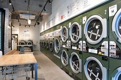 a row of washers sitting next to each other in front of a wooden table