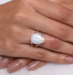 Rainbow Moonstone Ring, 925 Sterling Silver Ring, Crystal Ring, June Birthstone Ring, Handmade Silver Jewellery, Wedding Gift for Women Gemstone Name - Rainbow Moonstone  Stone Quality - AAA Ring Weight - 5.04 gm Ring Length - 2 cm  Ring Width - 1.4 cm  Stone Shape - As shown in the picture Ring Size - All Ring Size Available  You'll get the exact product as shown in the pictures We serve complete 925 sterling silver Jewelry and genuine properties of the stone. The products are dispatched from the small business from USA. Product Quality and Packaging - Our all products are 925 Silver Stamped which shows that the product is genuine and authentic .The products are dispatched from the small business from USA so you get the product on time and the product packaging comes in bubble foil wrap w Unique Moonstone Wedding Ring, Anniversary Fine Jewelry Moonstone Ring, White Solitaire Moonstone Ring, Silver Stackable Moonstone Rings, Fine Jewelry Silver Solitaire Moonstone Ring, White Stackable Moonstone Fine Jewelry Ring, Silver Solitaire Moonstone Ring, Fine Jewelry, White Stackable Moonstone Ring In Fine Jewelry Style, Sterling Silver Moonstone Ring For Anniversary