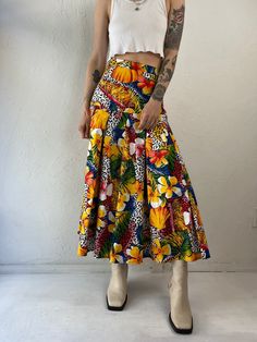 "90s Abstract Print Maxi Skirt  - Ms Frizzle Skirt - 1990s abstract floral animal print maxi skirt  - zipper closure  - Feels like cotton  - Small  Waist: 26\"  Length: 34\" Model is 5'7, typically wears a size small and is a 26\"-27\" waist. Measurements are taken seam to seam while lying flat and are not doubled. Please refer to measurements to ensure proper fit. Due to the nature of Vintage goods there may be minor flaws or imperfections. These add to the beauty and uniqueness of each item. All sales are final. When you are ready to purchase please read our shop policies. Model is 5'7, typically wears a size small and is a 26\"-27\" waist. Measurements are taken seam to seam while lying flat and are not doubled. Please refer to measurements to ensure proper fit. Due to the nature of Vin Animal Print Maxi Skirt, Ms Frizzle, Floral Print Midi Skirt, Print Maxi Skirt, Skirt Zipper, Printed Maxi Skirts, Denim Maxi Skirt, Printed Midi Skirt, Rayon Dress