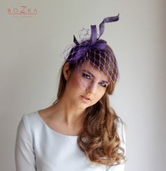 Handmade and hand formed sinamay in modern, minimalist and serpentine shape. It's decorated by original violet veiling at the top and short veiling covered part of face. All in beautifil violet colour. This item is all handmade with the highest precision. This fascinator is attached to silver metal headband (You can change on black or gold) You can ask to me for more informations. Ready to shipped in 3-5 working days. If You want to change something please write to me. I can personalized Your or Purple Headband Fascinator For Royal Ascot, Purple Wedding Fascinator For Royal Ascot, Elegant Purple Headband For Evening, Summer Wedding Purple Headband, Purple Fascinator For Royal Ascot Evening, Purple Fascinator For Evening At Royal Ascot, Purple Headband Mini Hat For Wedding, Elegant Purple Headpieces As Gift, Purple Wedding Mini Hat Headband