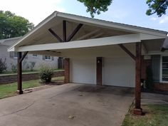 an attached carport in front of a house