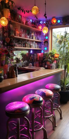 three stools in front of a bar with plants and lights on the wall behind it