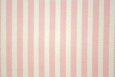 pink and white striped wallpaper with small dots