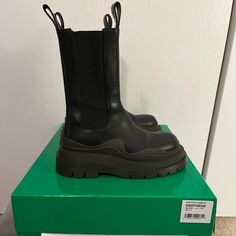 Size 36.5. Color: Camping A Rugged Take On A Classic Chelsea Silhouette, These Leather Mid-Calf Boots Are Anchored With A Contrast Lug Sole. Few Scuff Marks. Shoes Run Big. I’m Normally A Size 7/7.5. Please See Pics. Leather Upper Round Toe Pull-On Style Elasticized Sides Rubber Sole Made In Italy Bottega Veneta Shoes, Calf Boots, Mid Calf Boots, Lug Sole, Mid Calf, Bottega Veneta, Rubber Sole, Chelsea, Leather Upper