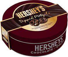 hershey's diped pretzels chocolate candy in a round tin container