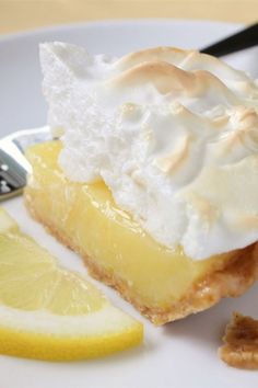 a piece of lemon meringue pie on a plate